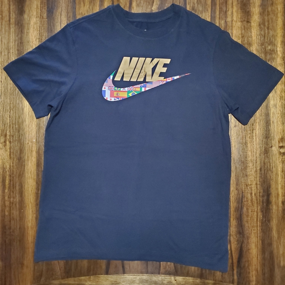 Nike Men's Black Tee with Gold Logo